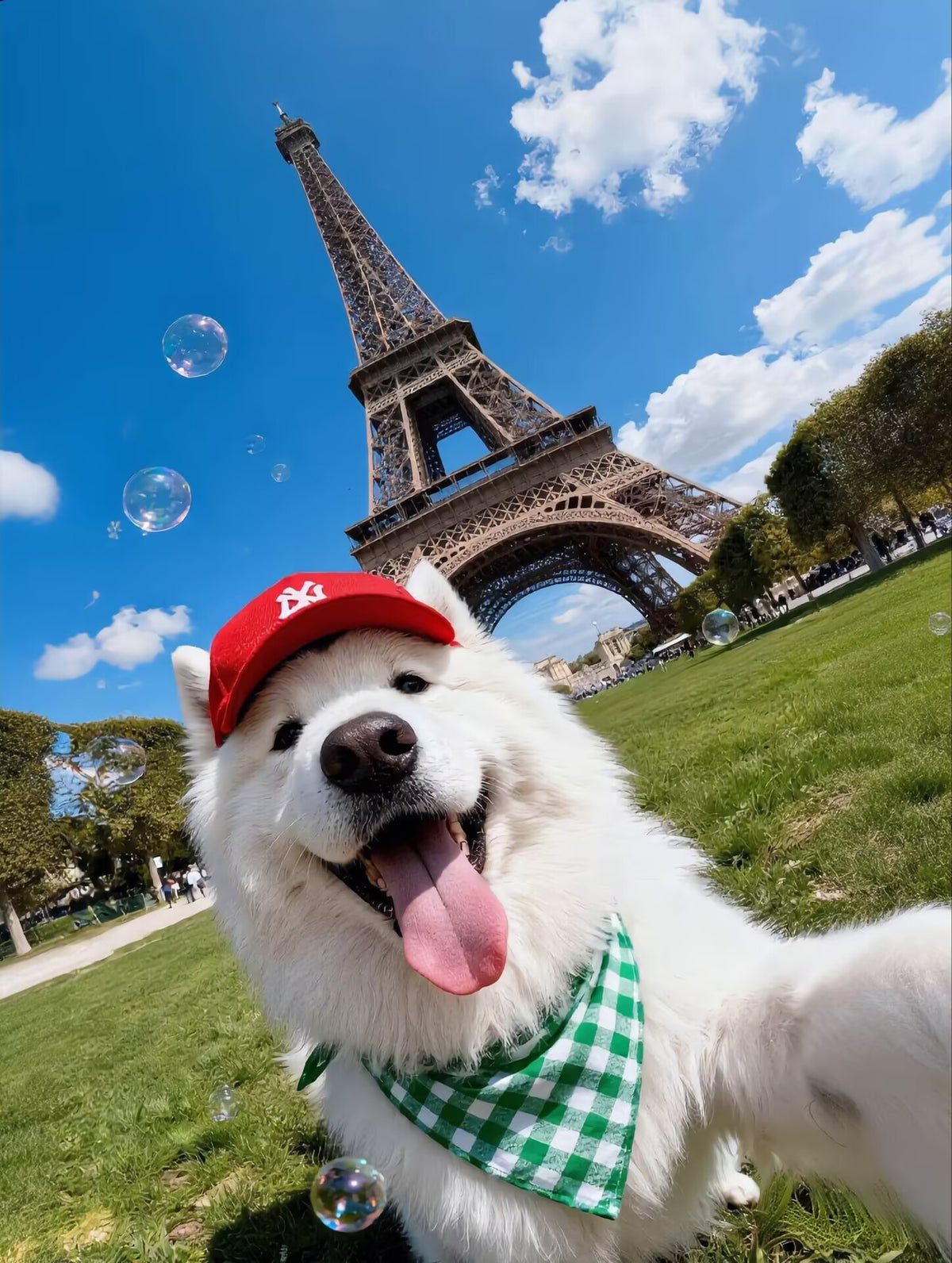 White Samoyed dog wearing a red cap and green bandana in front of the Eiffel Tower in Paris.